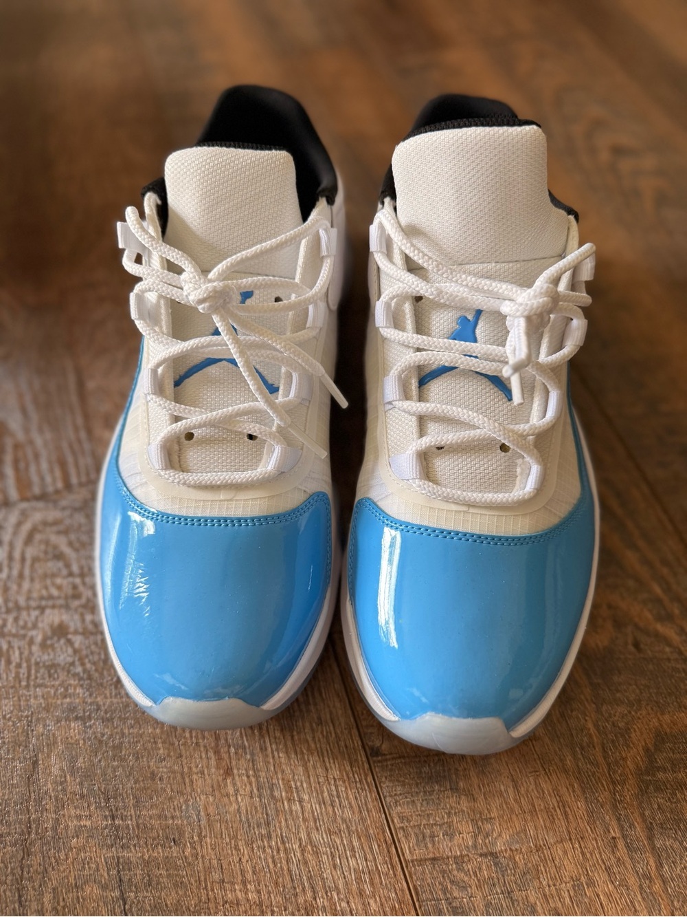 Nike Jordan 11 Blue and White Low-Top Athletic Sneakers